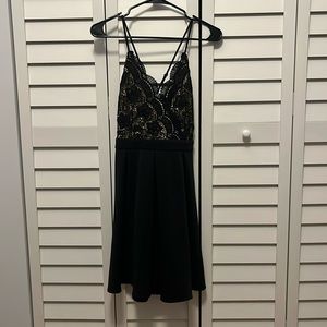Francesca’s black lace dress